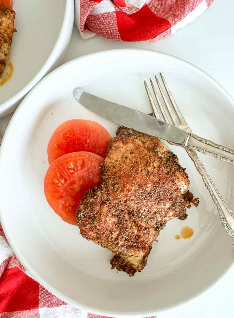 Chicken with a fork and knife.