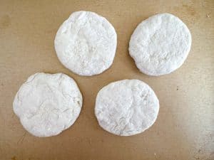 Small batch biscuits on a baking sheet ready to bake.
