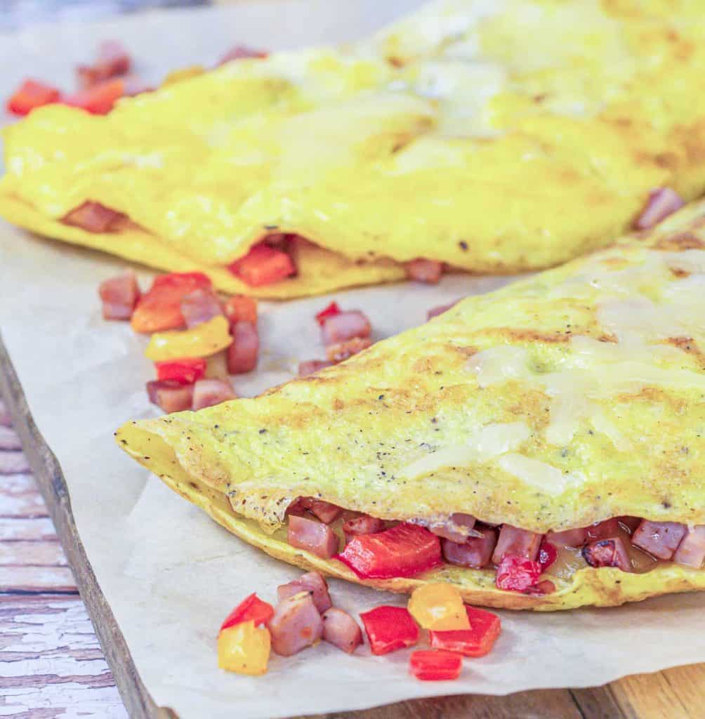 Eggs with vegetable on a cutting board. 