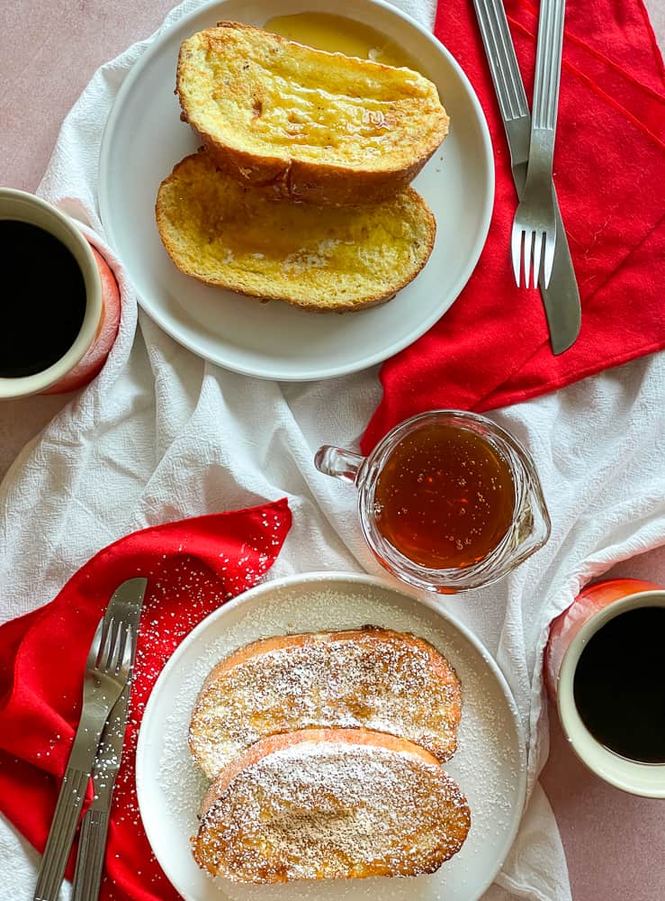 Two plates of french toast.