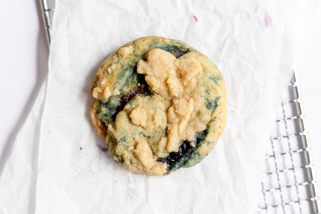A single blueberry muffin cookie. 