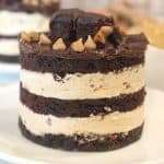 Stacked dessert of brownies and mousse.