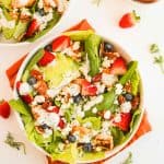 Two bowls of Fresh Spring Salad with Greek Yogurt Dressing.