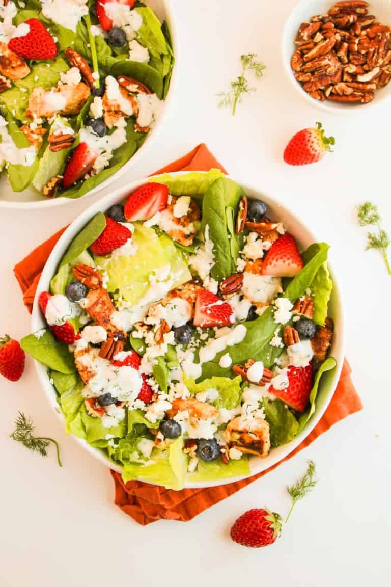 Two bowls of Fresh Spring Salad with Greek Yogurt Dressing.
