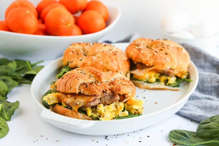 Side view of croissant breakfast sandwich filling.