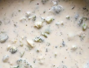 Creamy broccoli cheese soup in the pot.