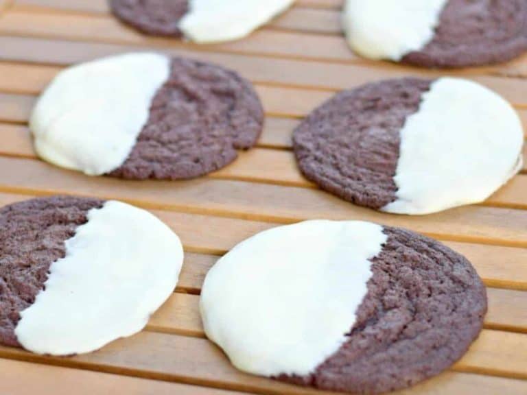 Chocolate cookies half-dipped in white chocolate.
