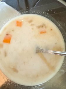 Blended portion of stew in a blender jar.