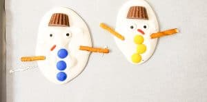 Colorful candy buttons added to the snowmen.
