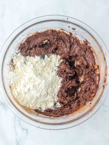 Chocolate cookie dough mixed with flour.